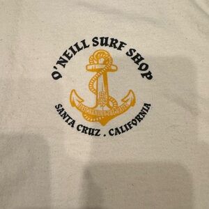 O’Neill Surf Shop Santa Cruz Cream Tee with Gold Anchor Design